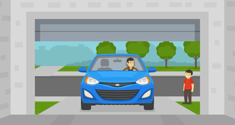 Image of a man driving into his garage with a child waiting nearby.